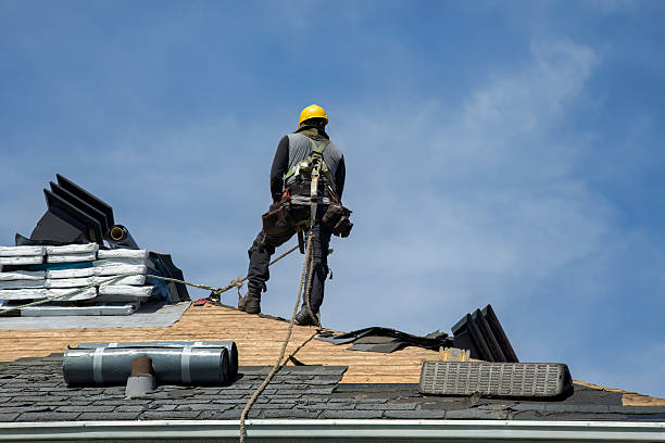 Professional Roofing technician working in Adamsville, RI